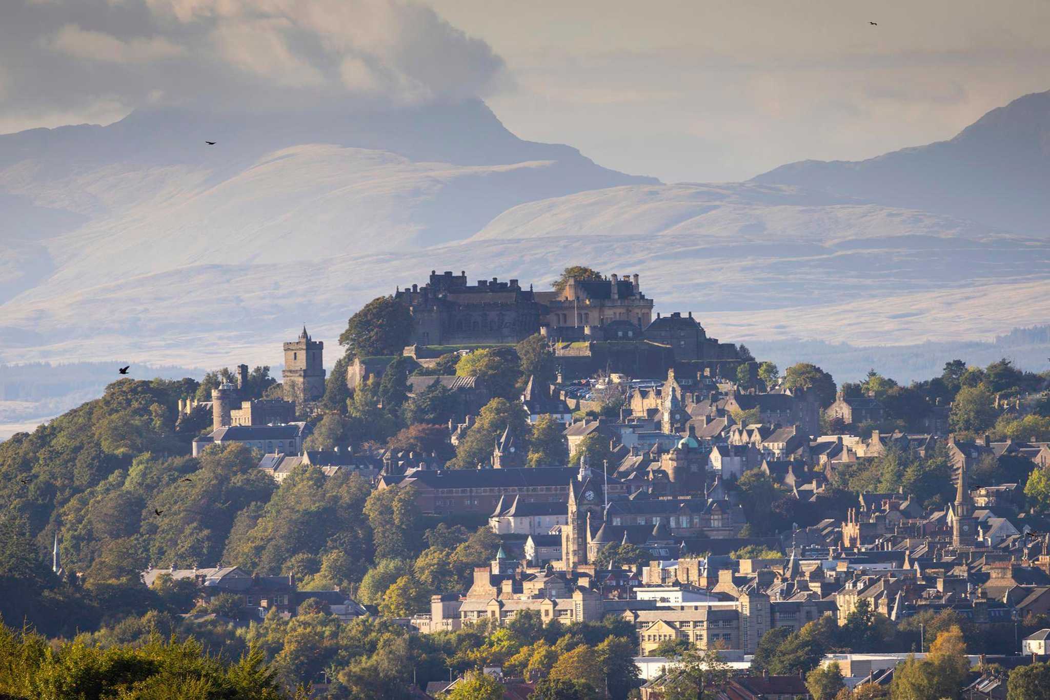 A magnificent view of Stirling Castle and The City of Stirling with hills in the background