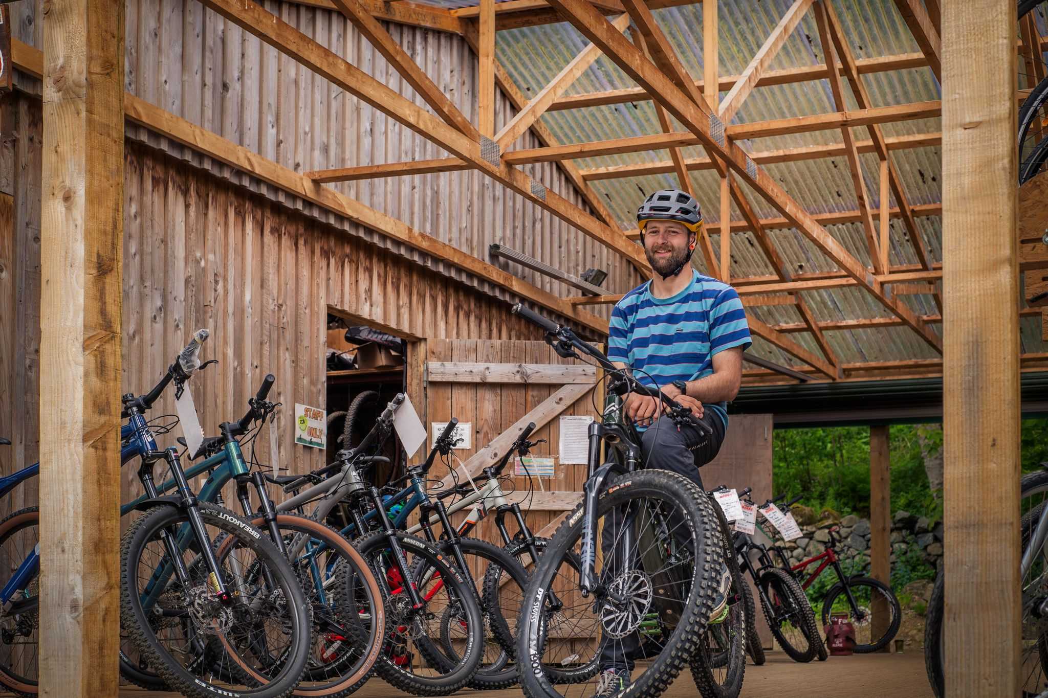Getting mountain bikes ready in shed