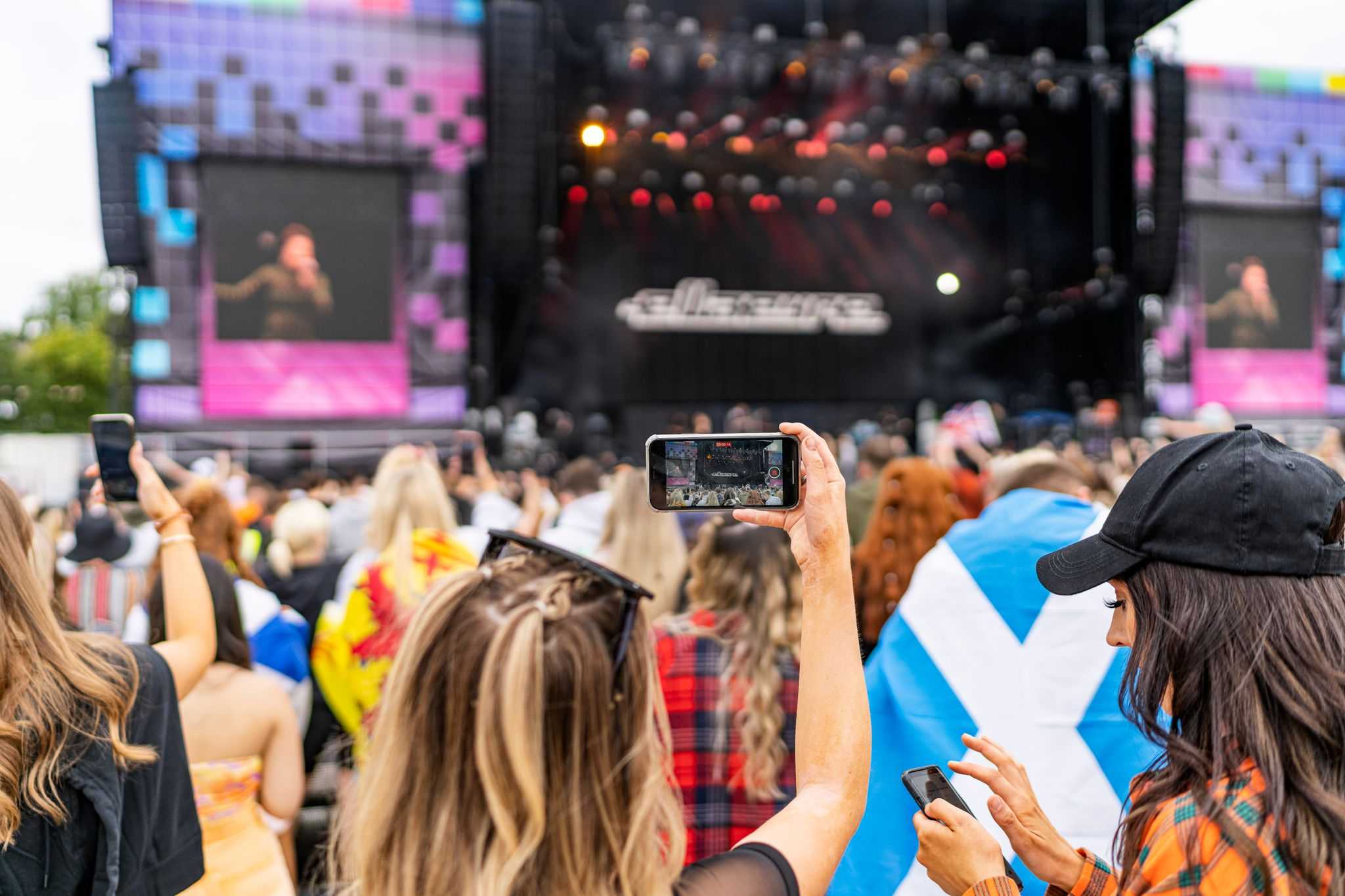 Crowds in front of music festival stage