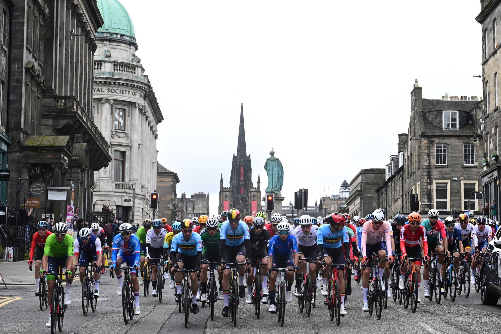 Cyclists taking part in the 2023 UCI Cycling World Championships cycle through Edinburgh