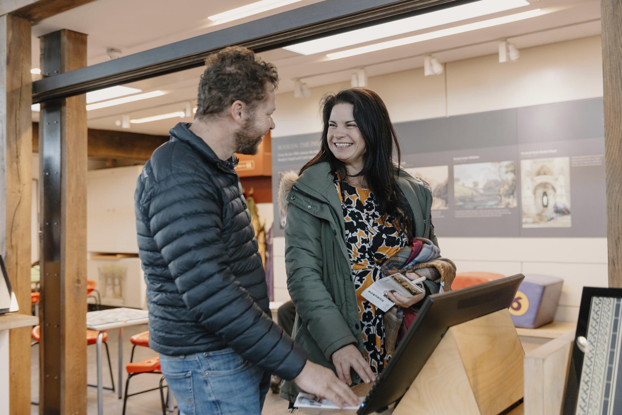 Two customers enjoying browsing the visitor centre